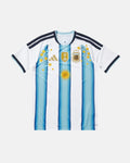 Argentina hand-embroidered 2026 home concept jersey front view — gold Sol de Mayo sun, laurel stars and botanical art on authentic albiceleste base — VOLTA Sol de Oro Edition