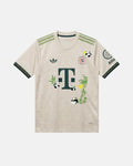 Bayern Munich hand-embroidered concept jersey front view — giant pandas and bamboo botanical art on authentic stone beige base with forest green details — VOLTA Hellabrunn Edition