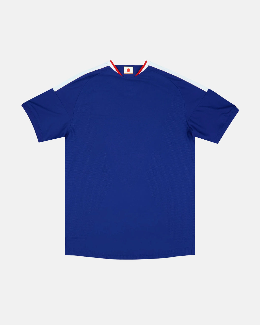 Full back view of the Japan Concept Jersey, showing the clean deep indigo blue fabric, the authentic ribbed V-neck collar, and the athletic cut of this exclusive kit.