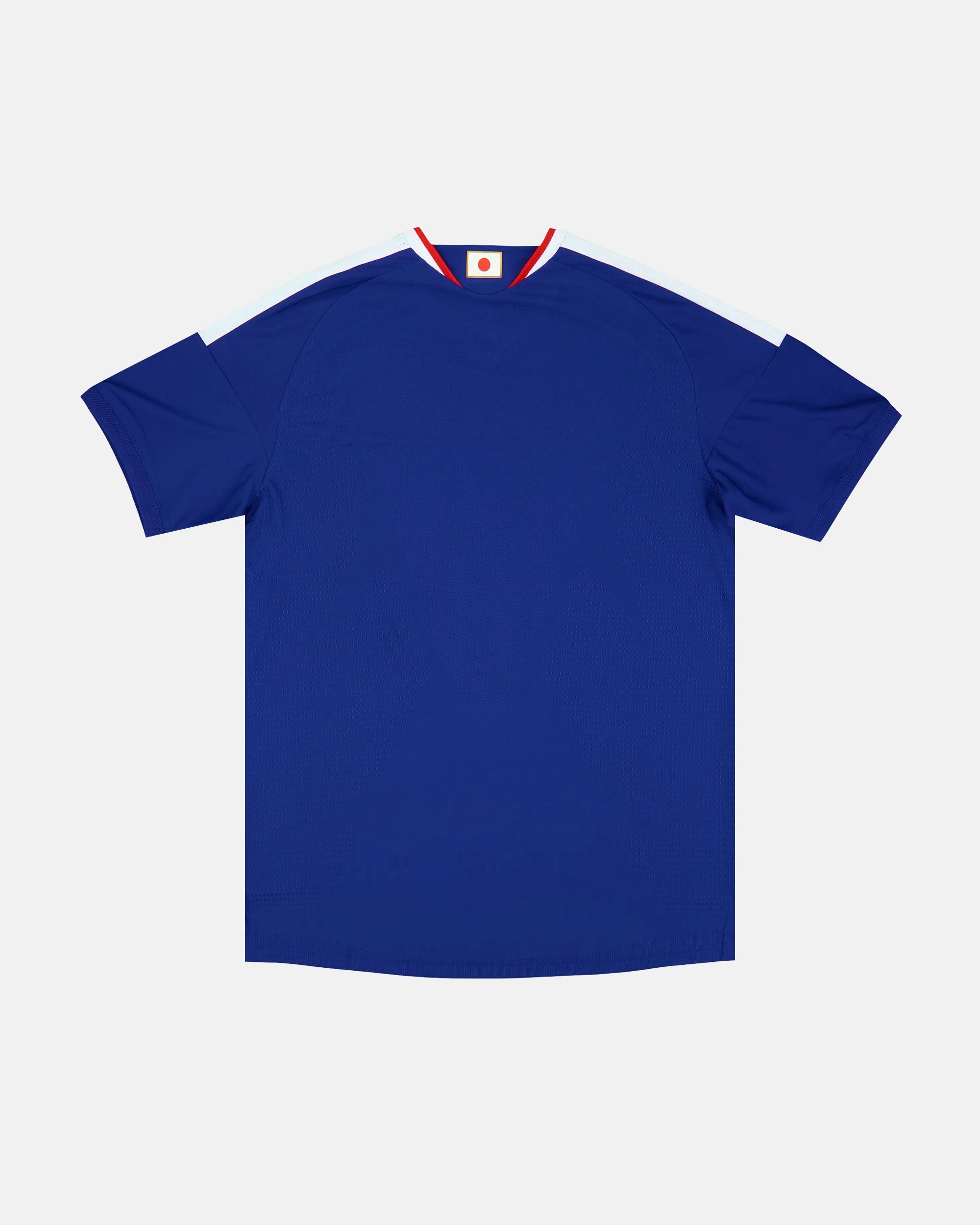 Full back view of the Japan Concept Jersey, showing the clean deep indigo blue fabric, the authentic ribbed V-neck collar, and the athletic cut of this exclusive kit.