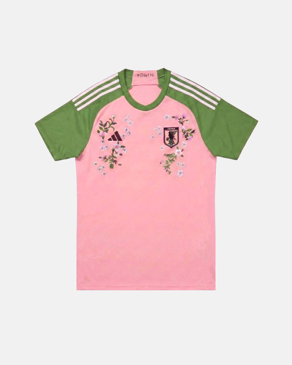 Japan hand-embroidered concept jersey front view — cherry blossom sakura botanical art on authentic pink base — VOLTA Sakura Rising Edition