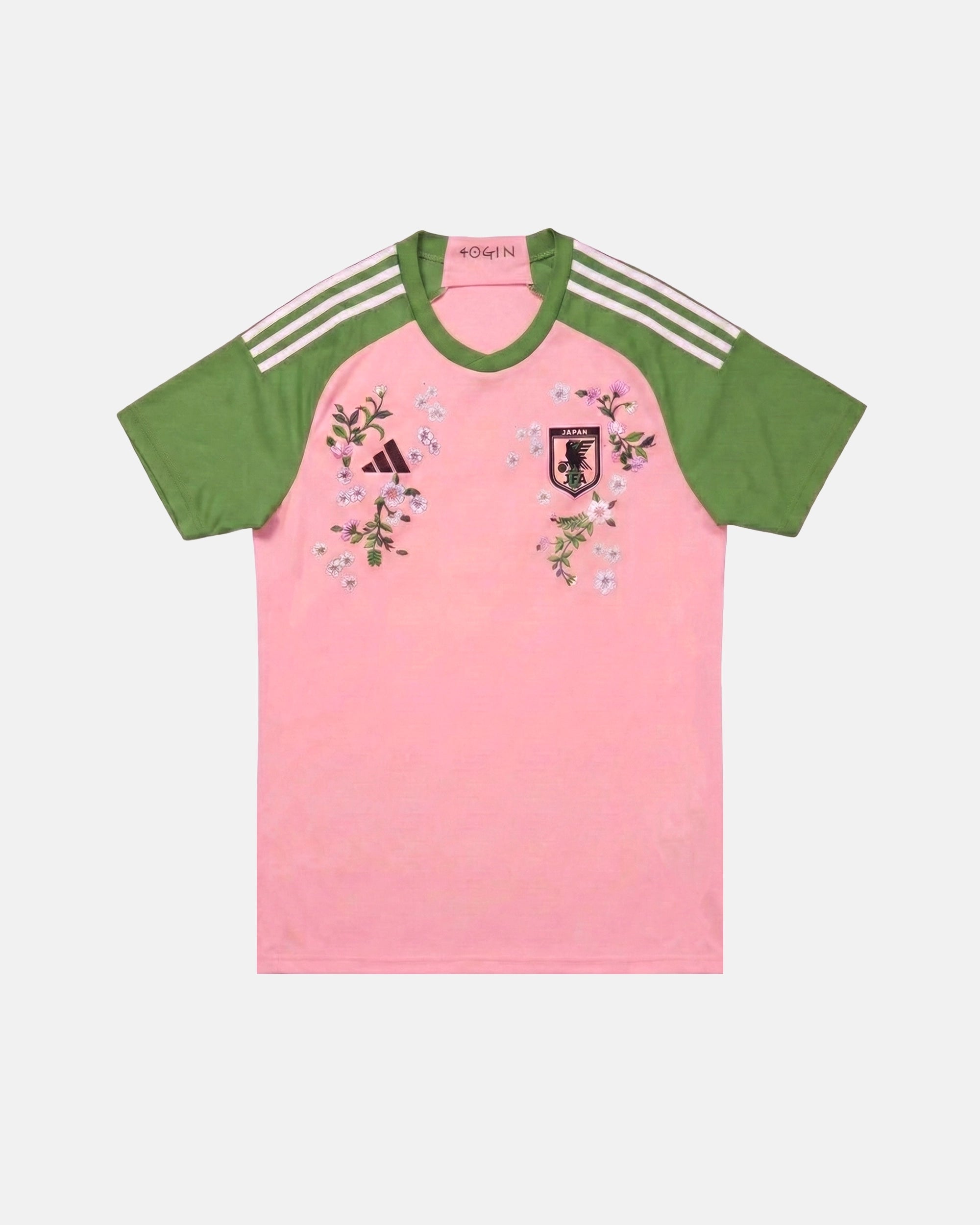 Japan hand-embroidered concept jersey front view — cherry blossom sakura botanical art on authentic pink base — VOLTA Sakura Rising Edition