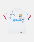 Full Front View Of The Bespoke Barcelona Embroidered Jersey (Azulejo White Edition), Showcasing The White Base Decorated With Hand-Stitched Silver Lilies and Cobalt Flowers.