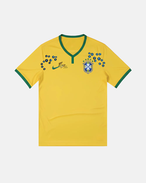 Full Front View Of The Brazil 2014 Jersey Reimagined (Samba Blossom Edition) In Canary Yellow Featuring Custom Hand-Embroidered Indigo Flowers and Green Botanical Art.