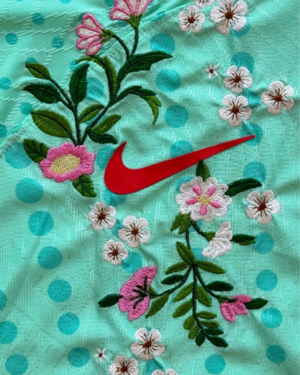 Hand-embroidered pink peach blossoms and white cherry blossom branches on China concept jersey — artisanal floral embroidery — VOLTA Paris & Versailles