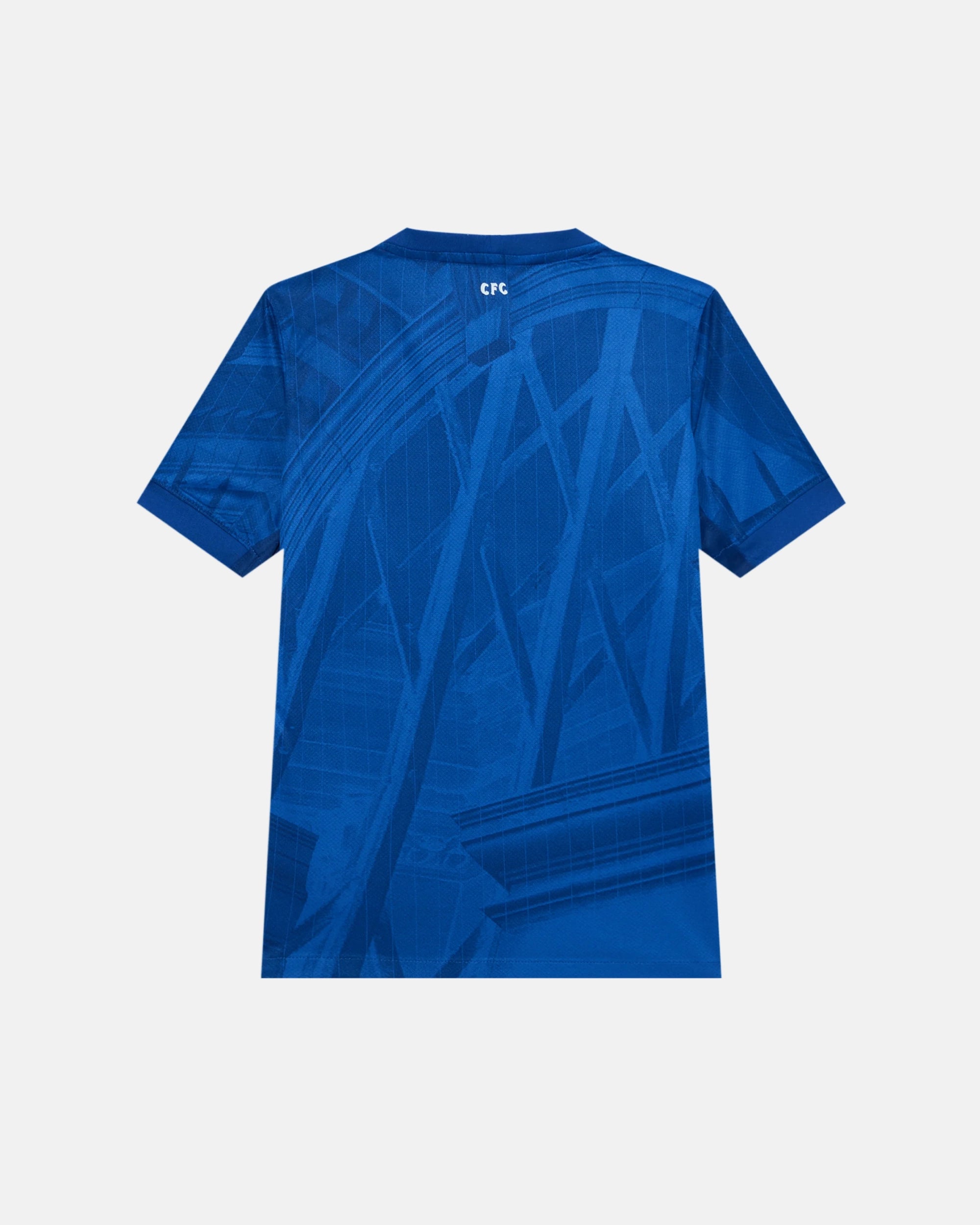 Full Back View Of The Chelsea Concept Jersey Base, Highlighting The Sublimated Tonal Blue London Architecture Graphic Pattern And White CFC Neck Graphic.