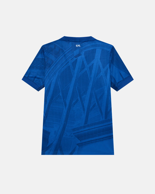 Full Back View Of The Chelsea Concept Jersey Base, Highlighting The Sublimated Tonal Blue London Architecture Graphic Pattern And White CFC Neck Graphic.
