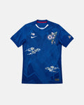 Full Front View Of The Bespoke Chelsea Embroidered Jersey (Edo Blossom Edition), Showcasing The Royal Blue Geometric Base Decorated With Hand-Stitched Pink Sakura And White Clouds.