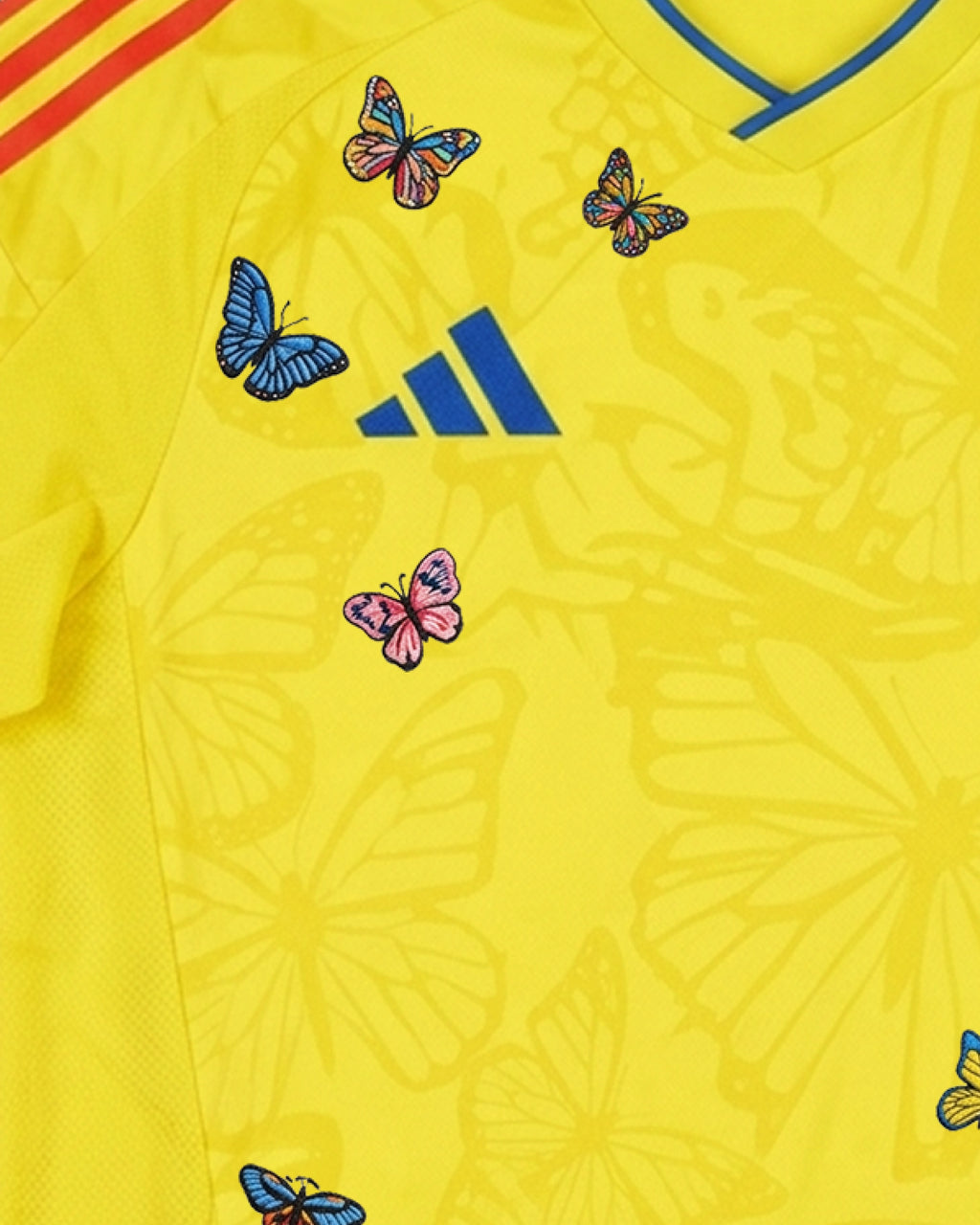 Multicolour hand-embroidered butterflies on Colombia 'Mariposa' Edition football jersey — VOLTA Paris