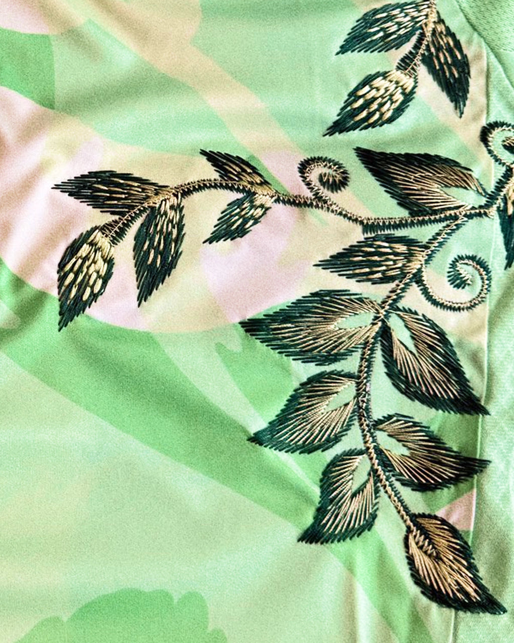 Macro Texture Shot Focusing On the Upper Right Torso Of the Custom Embroidered Mint Italy Shirt, Highlighting The Dense Haptic 3D Thread Quality Of Bronze And Green Leaves.