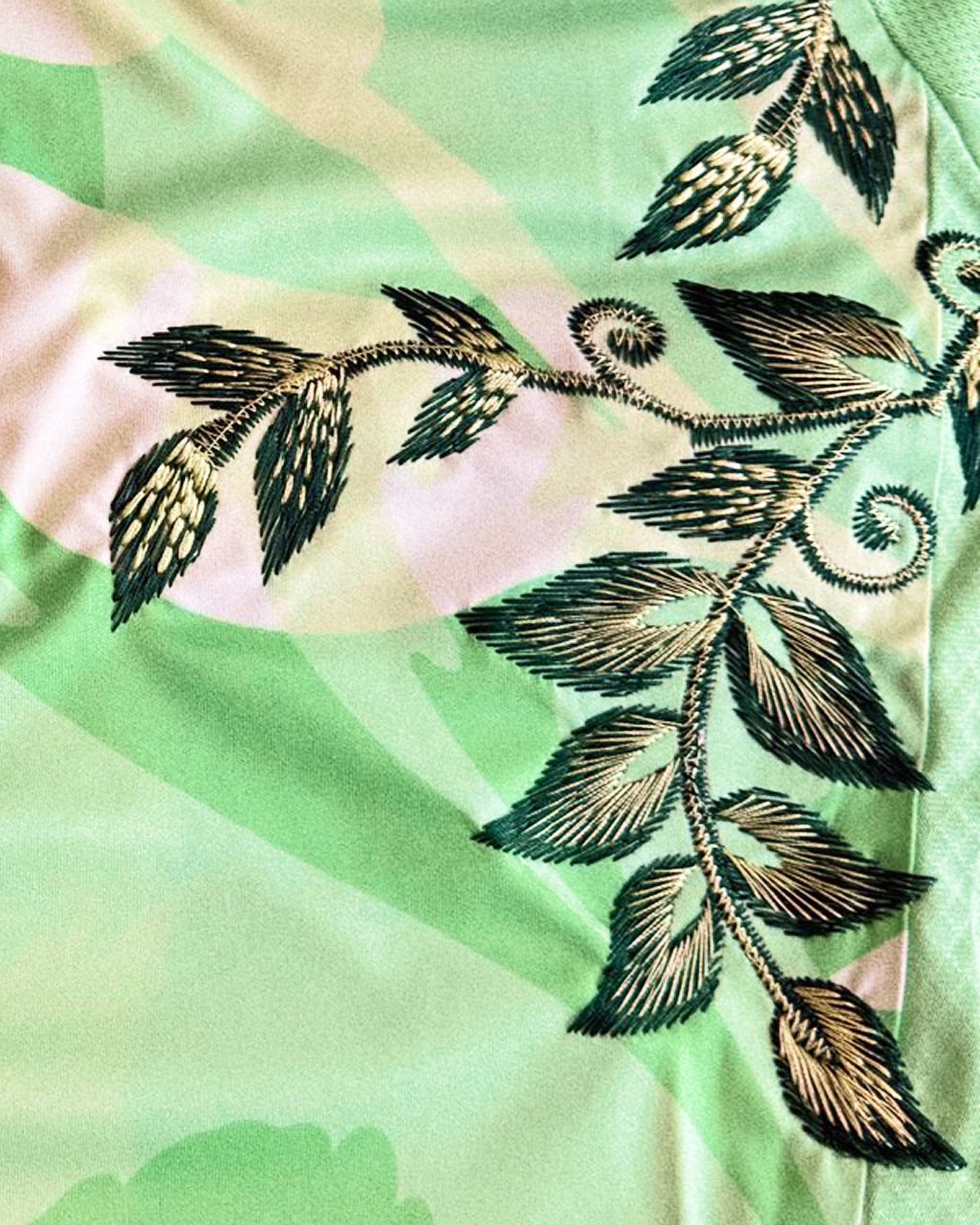 Macro Texture Shot Focusing On the Upper Right Torso Of the Custom Embroidered Mint Italy Shirt, Highlighting The Dense Haptic 3D Thread Quality Of Bronze And Green Leaves.