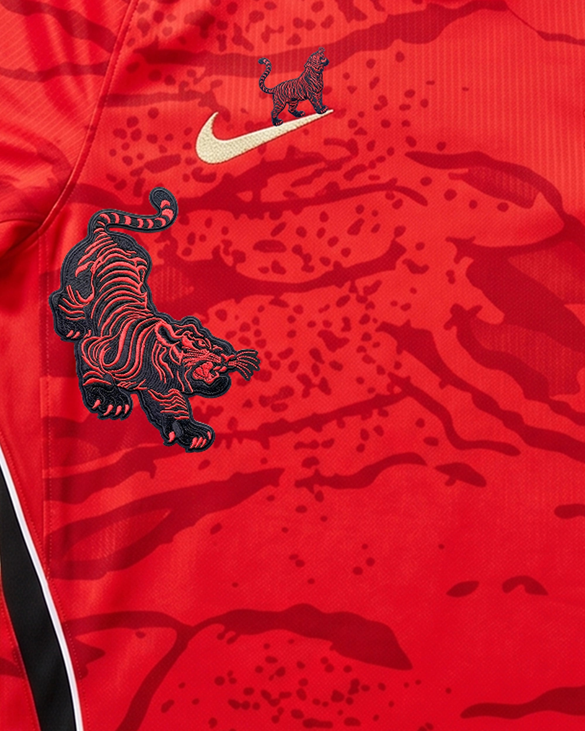 Close-Up Macro Shot Focus On The Right Torso Detail Of the Custom South Korea Home Kit, Highlighting The Dense Haptic 3D Thread Quality Of A Traditional Black and Gold Tiger.