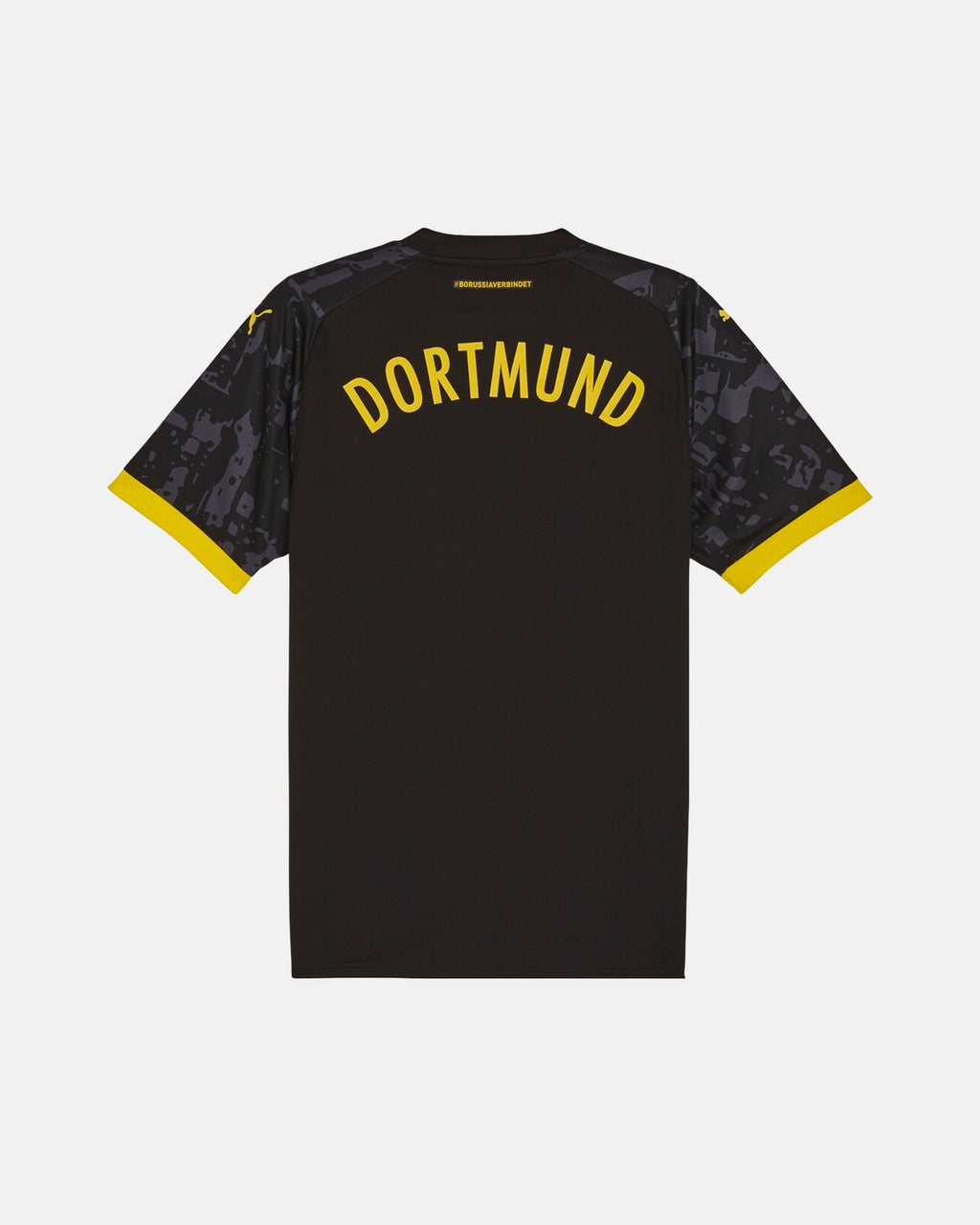 Full Back View Of The Dortmund Special Edition Jersey Reimagined Base, Highlighting The Stealth Charcoal Back, Yellow Dortmund Typography, And Yellow Cuffs.