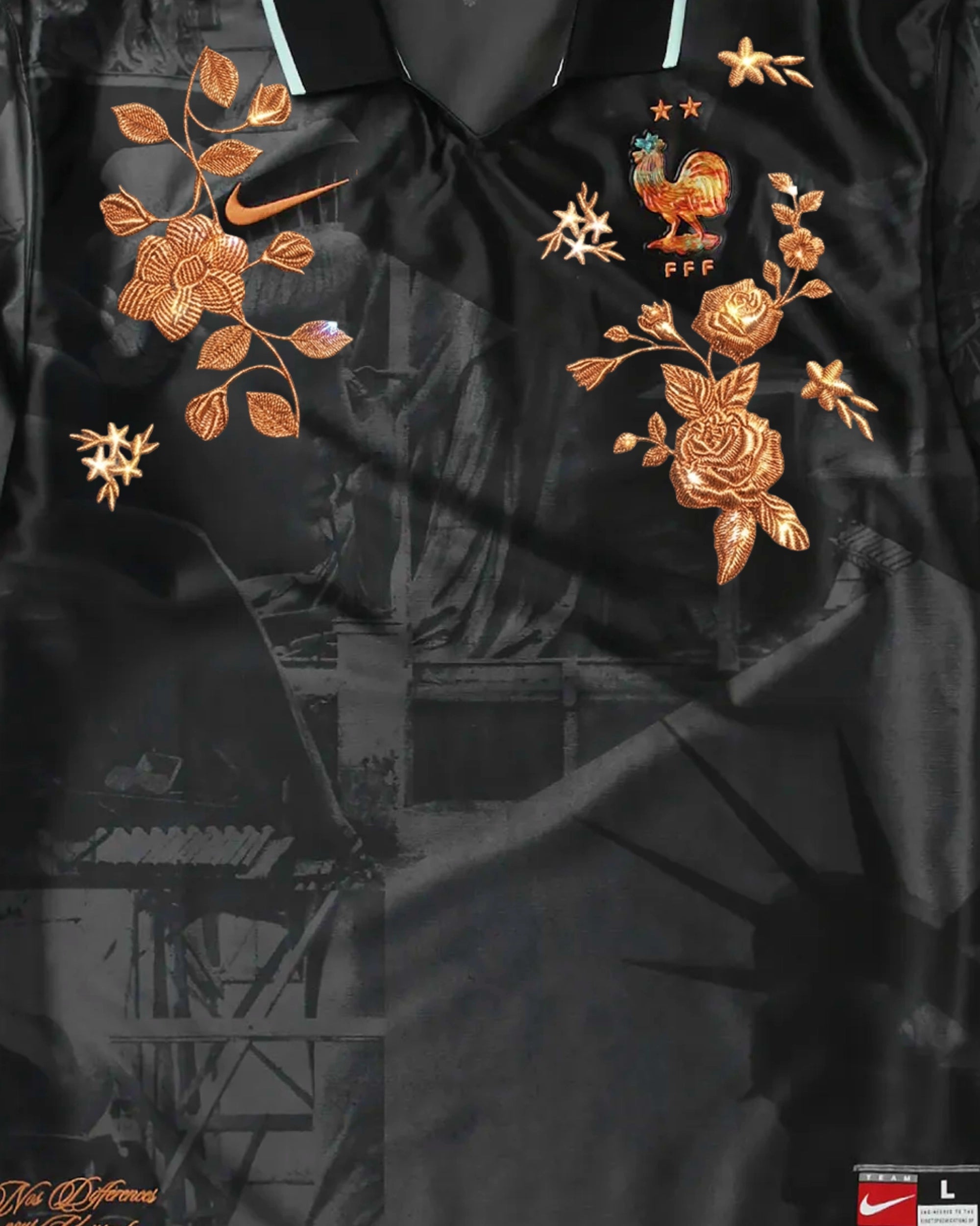 FFF France rooster badge with two stars surrounded by hand-embroidered bronze roses and botanical stems on black heritage concept jersey — artisanal embroidery VOLTA Paris & Versailles