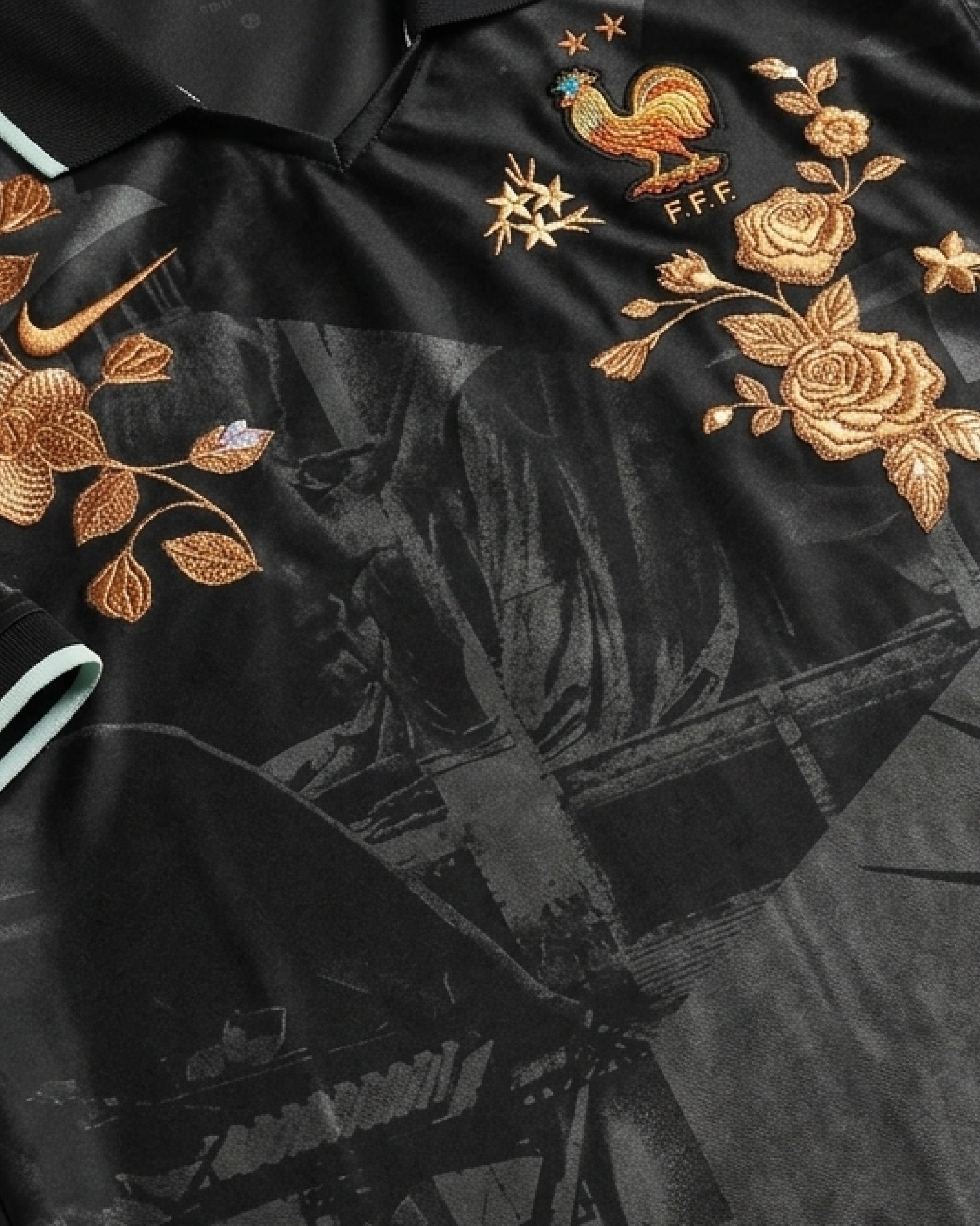 France FFF badge with hand-embroidered bronze roses and tonal Paris heritage architectural photographic montage on black concept jersey — VOLTA Nos Différences Edition