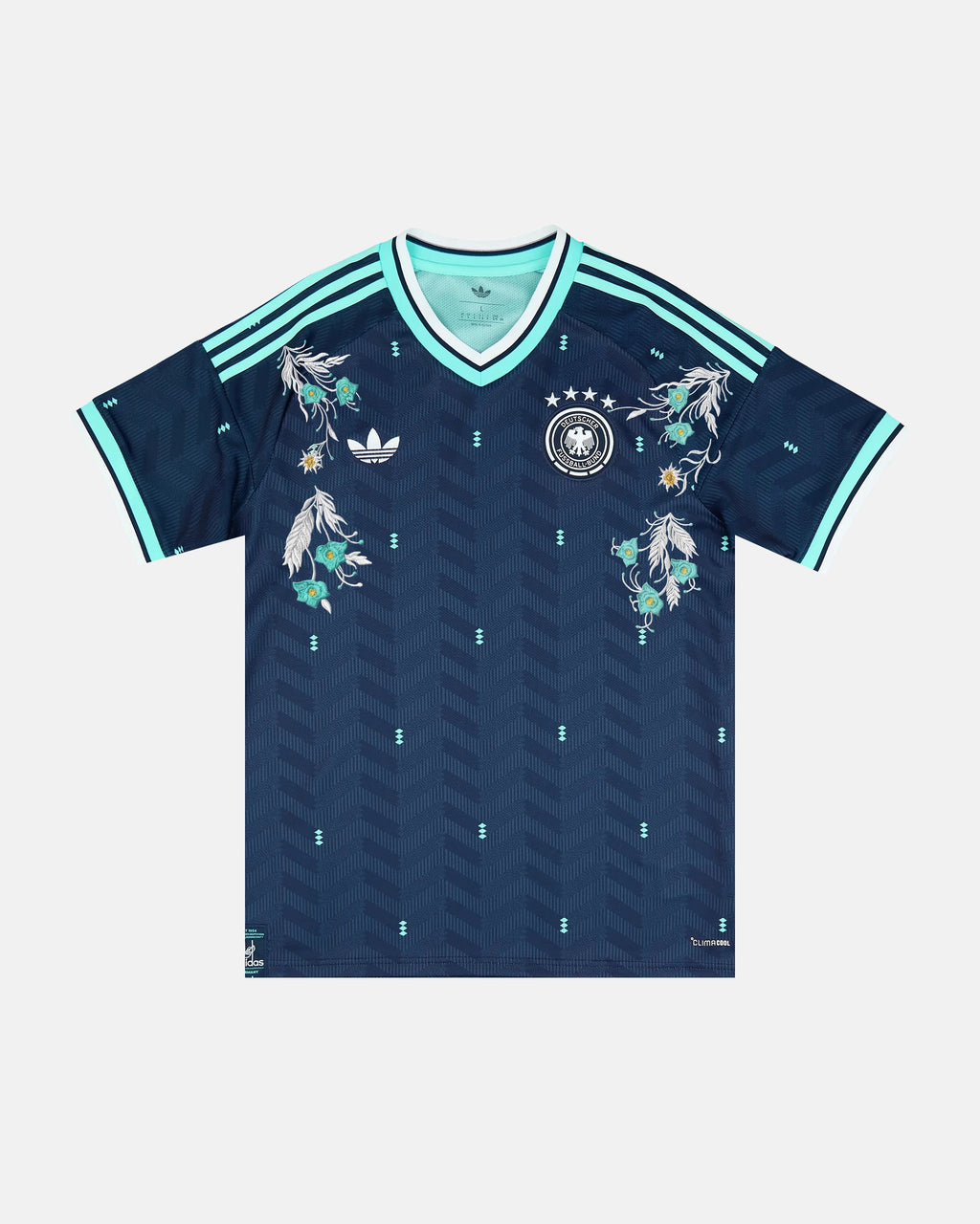 Full Front View Of The Bespoke Germany World Cup 2026 Jersey Reimagined, Showcasing The Navy Chevron Base, Mint Cuffs, and Silver Alpine Edelweiss Embroidery.