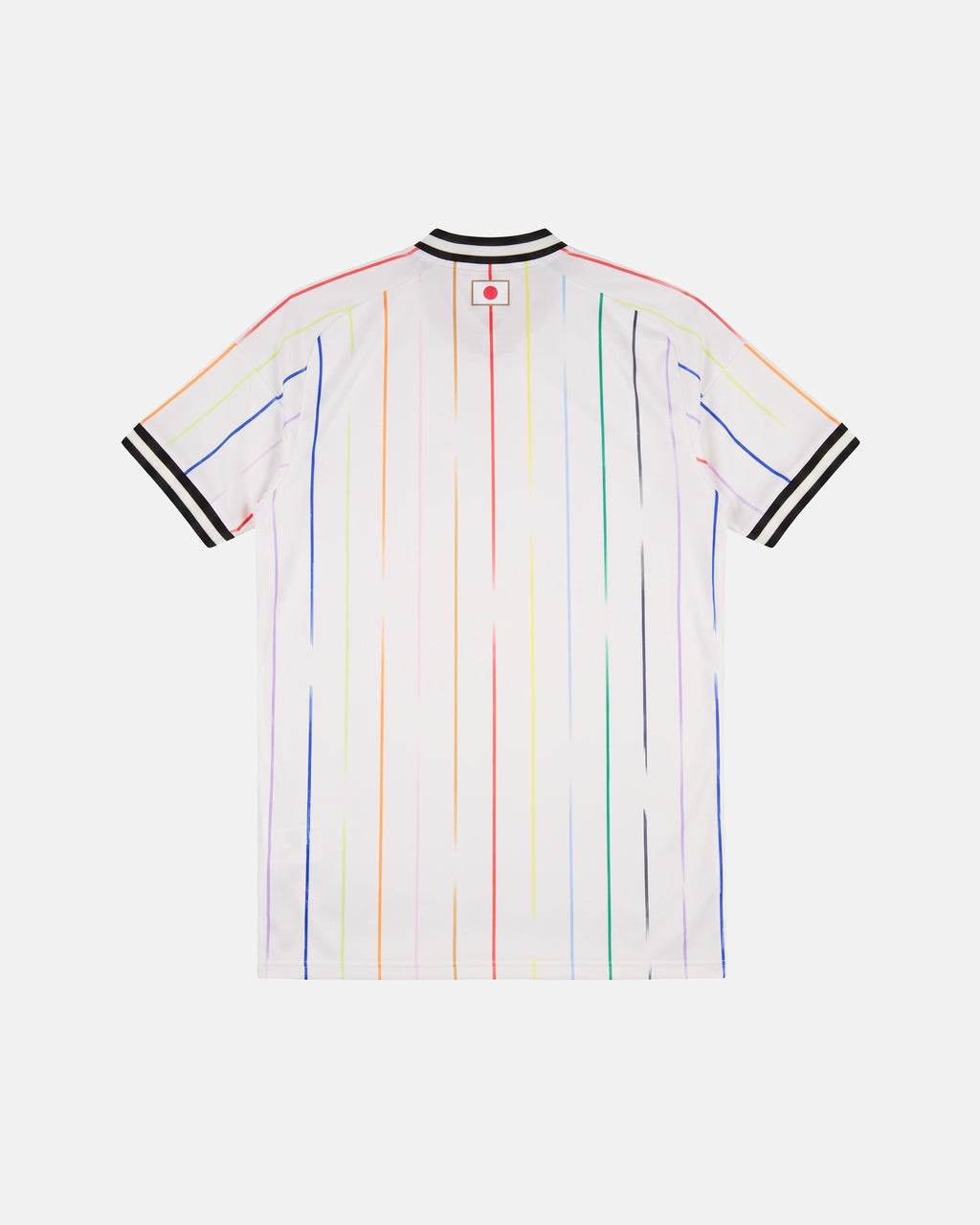 Full Back View Of The Japan World Cup Jersey Reimagined Base, Highlighting The White Fabric, Vertical Rainbow Stripes, And The Embroidered Japanese Flag Patch On The Neck.