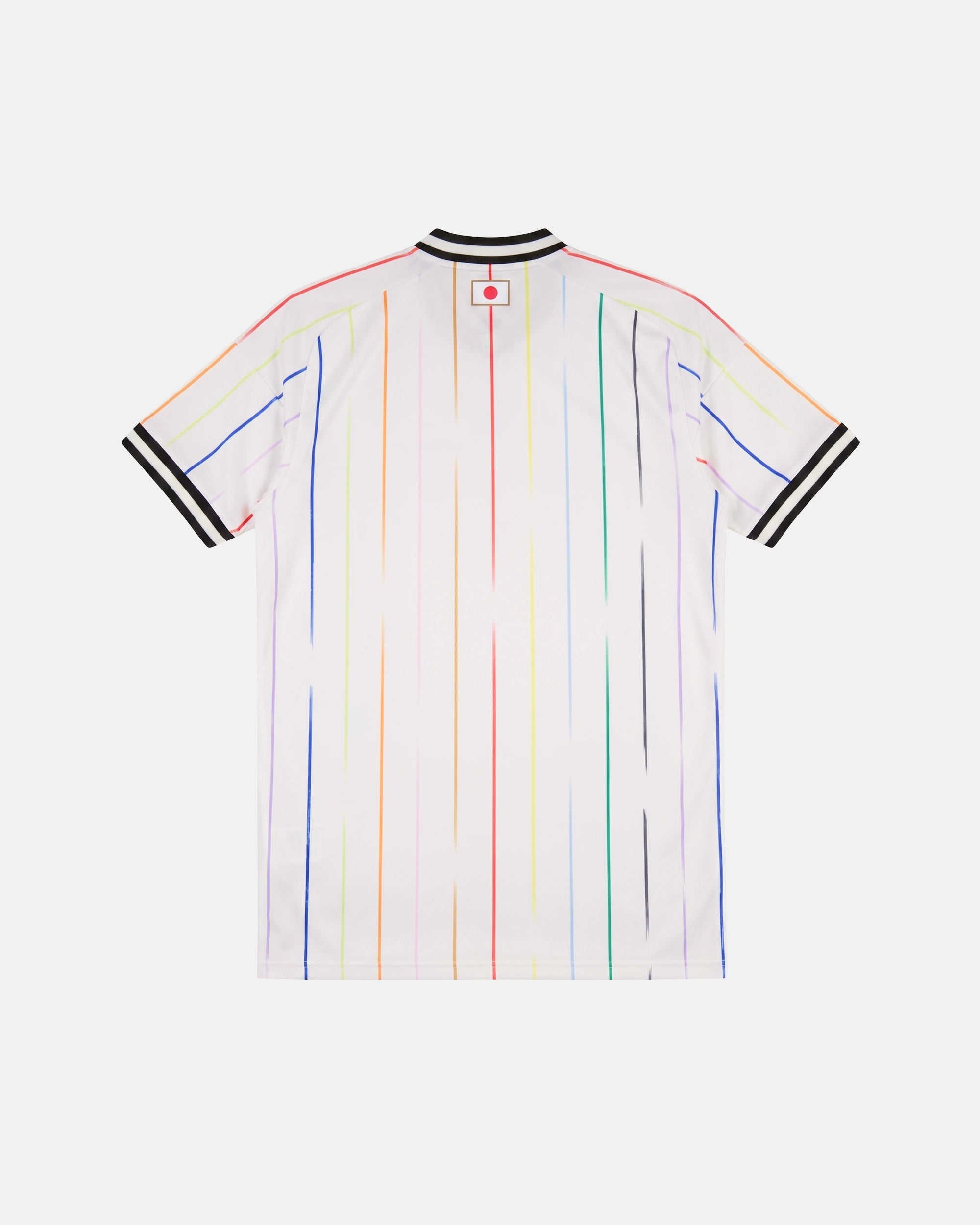 Full Back View Of The Japan World Cup Jersey Reimagined Base, Highlighting The White Fabric, Vertical Rainbow Stripes, And The Embroidered Japanese Flag Patch On The Neck.