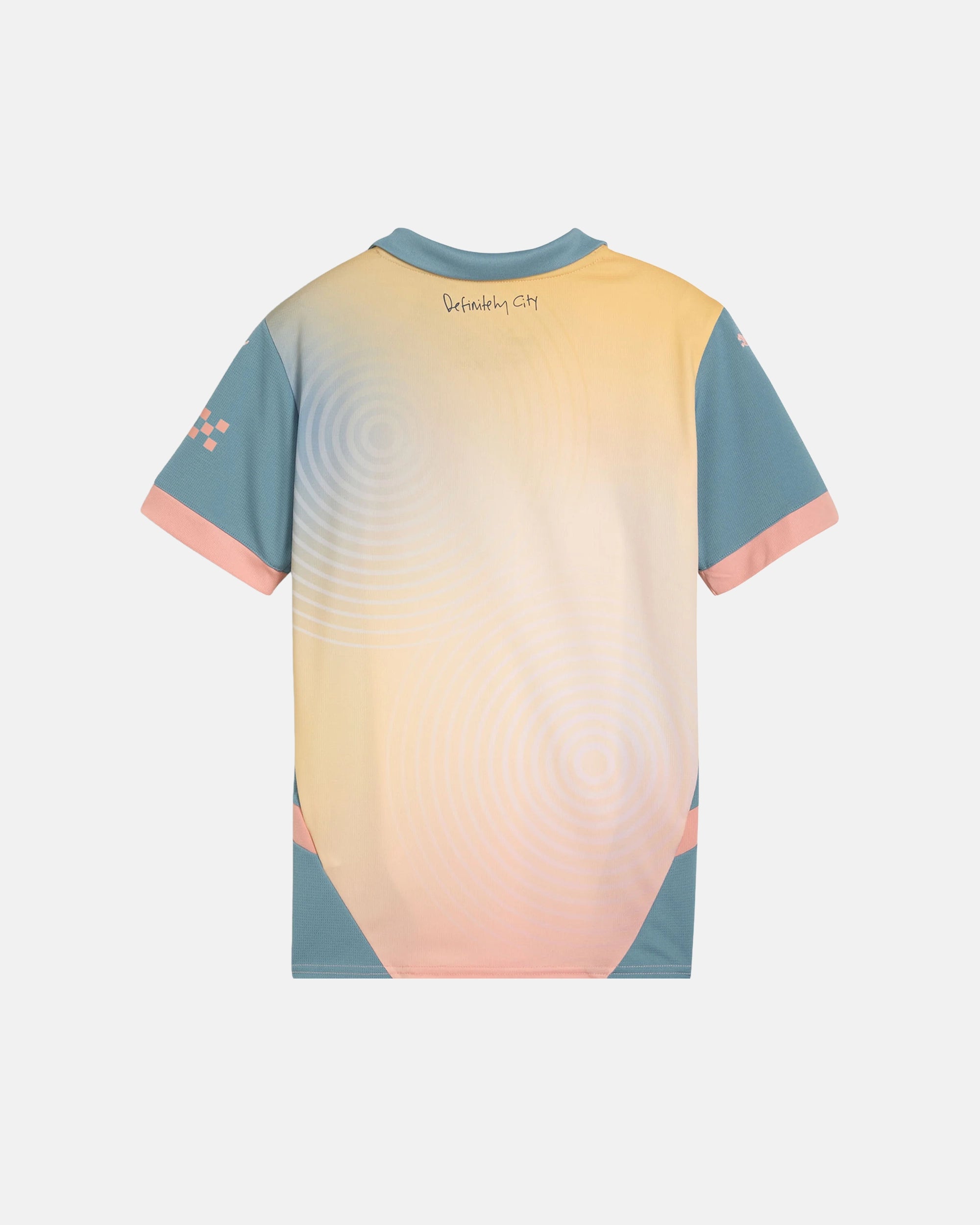 Full Back View Of The Man City Fourth Kit Revisited Base, Highlighting The Clean Peach Fabric, Sky Blue Sleeves, And The Definitely City Handwritten Script Font On The Neck.