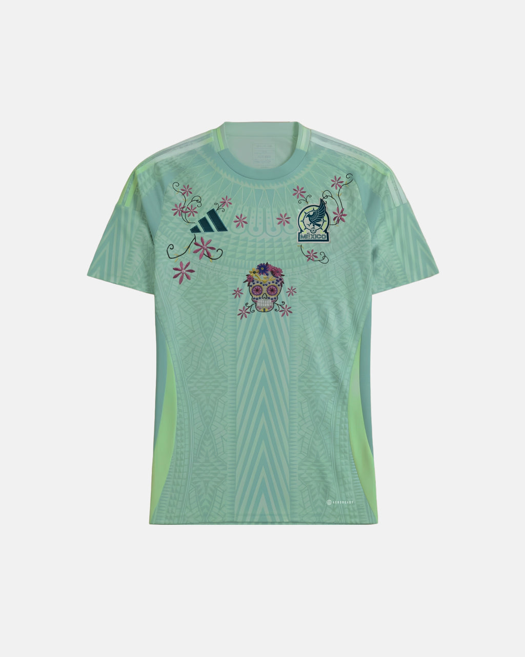 Full Front View Of The Bespoke Mexico Embroidered Jersey (Calavera Edition), Showcasing The Mint Green Aztec-Patterned Base Decorated With A Hand-Stitched Sugar Skull and Magenta Flowers.