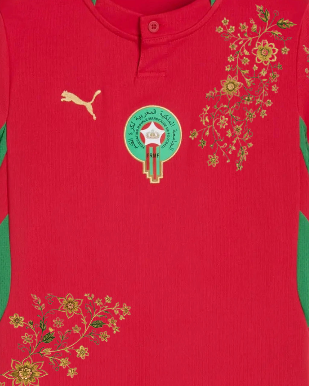 Close-up of hand-embroidered gold botanical arabesque beside FRMF badge — Morocco 'Fassi Gold' Edition — VOLTA Paris