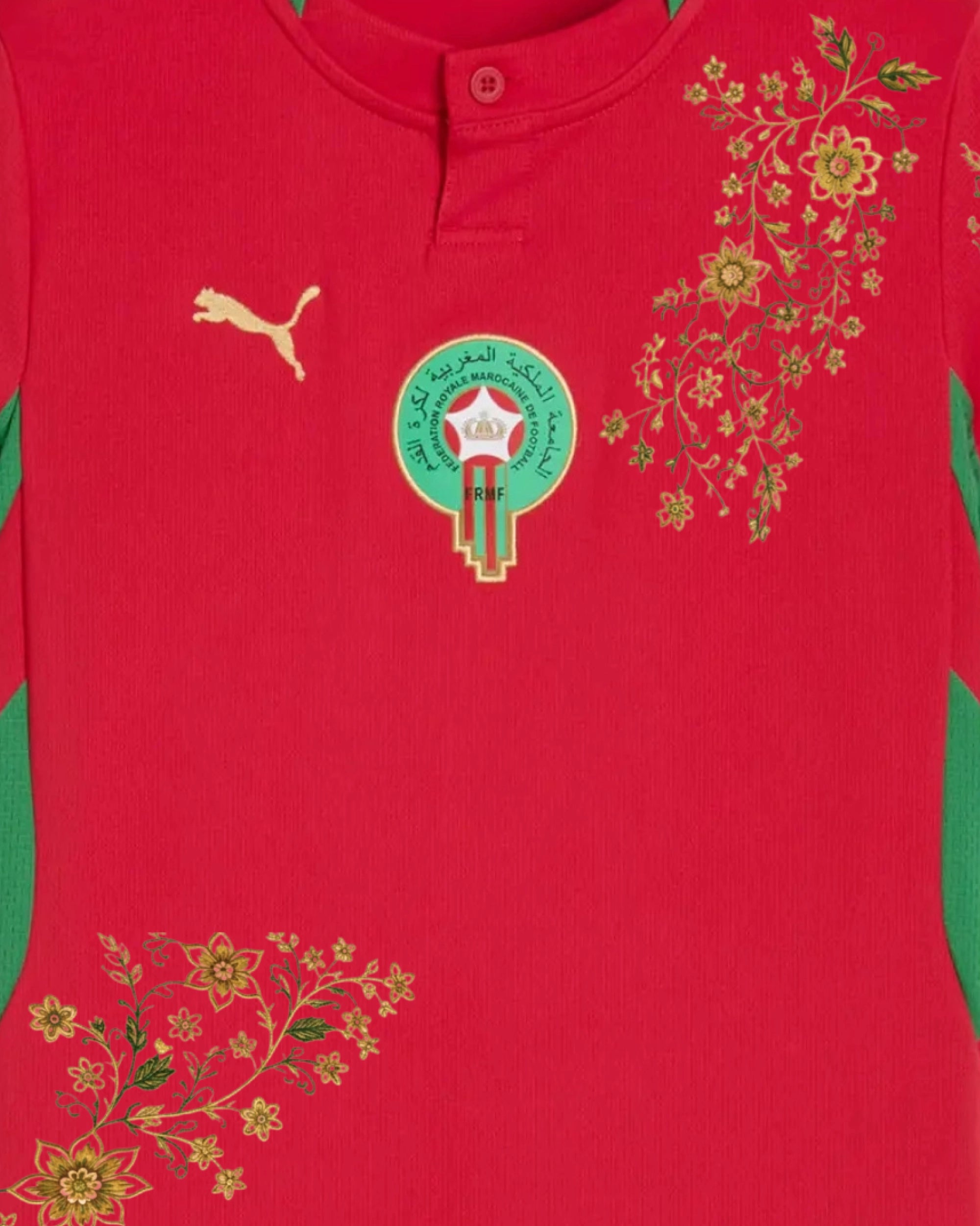 Close-up of hand-embroidered gold botanical arabesque beside FRMF badge — Morocco 'Fassi Gold' Edition — VOLTA Paris