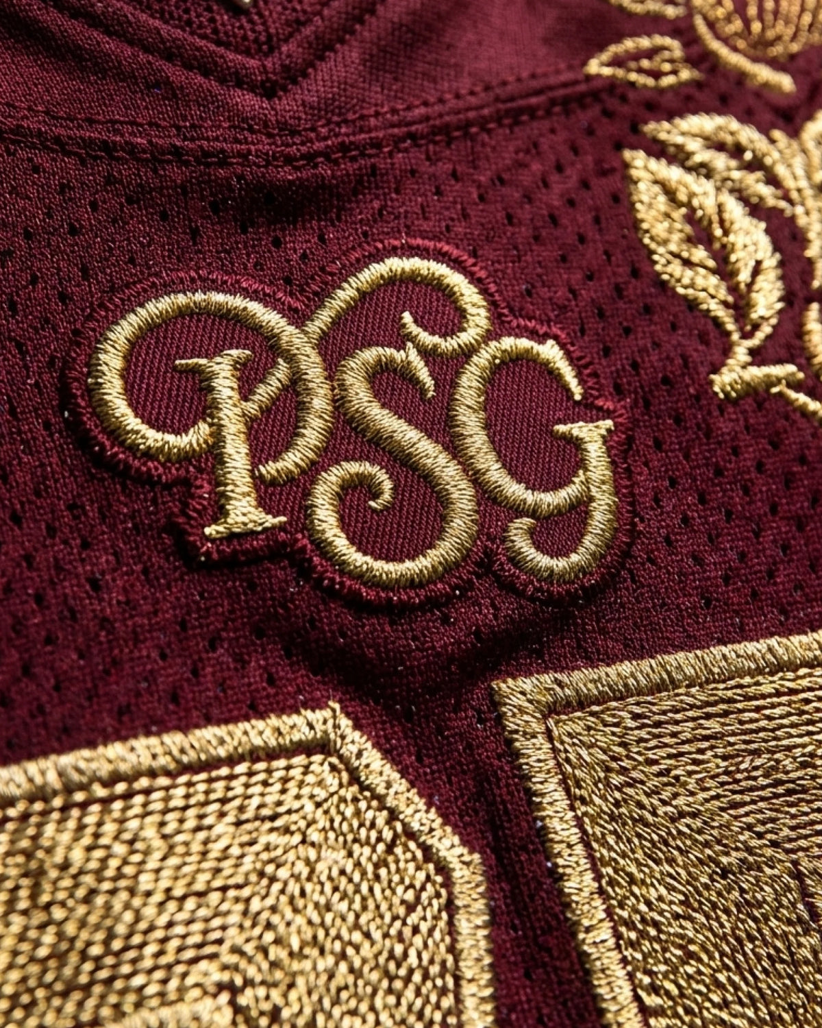 Extreme Macro Close-Up On The Golden Embossed Number 75 And Texturized Stitches, Showing The Exceptional Artisan Quality of The Paris Atelier.