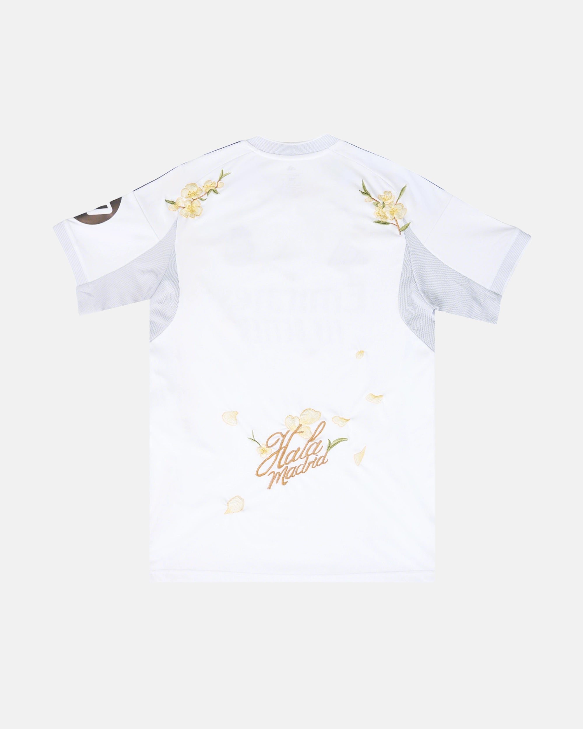 Full Back View Of The Real Madrid Concept Jersey Base, Highlighting The Clean White Torso, Golden Shoulder Blossoms, And Hand-Stitched Cursive Hala Madrid Script.