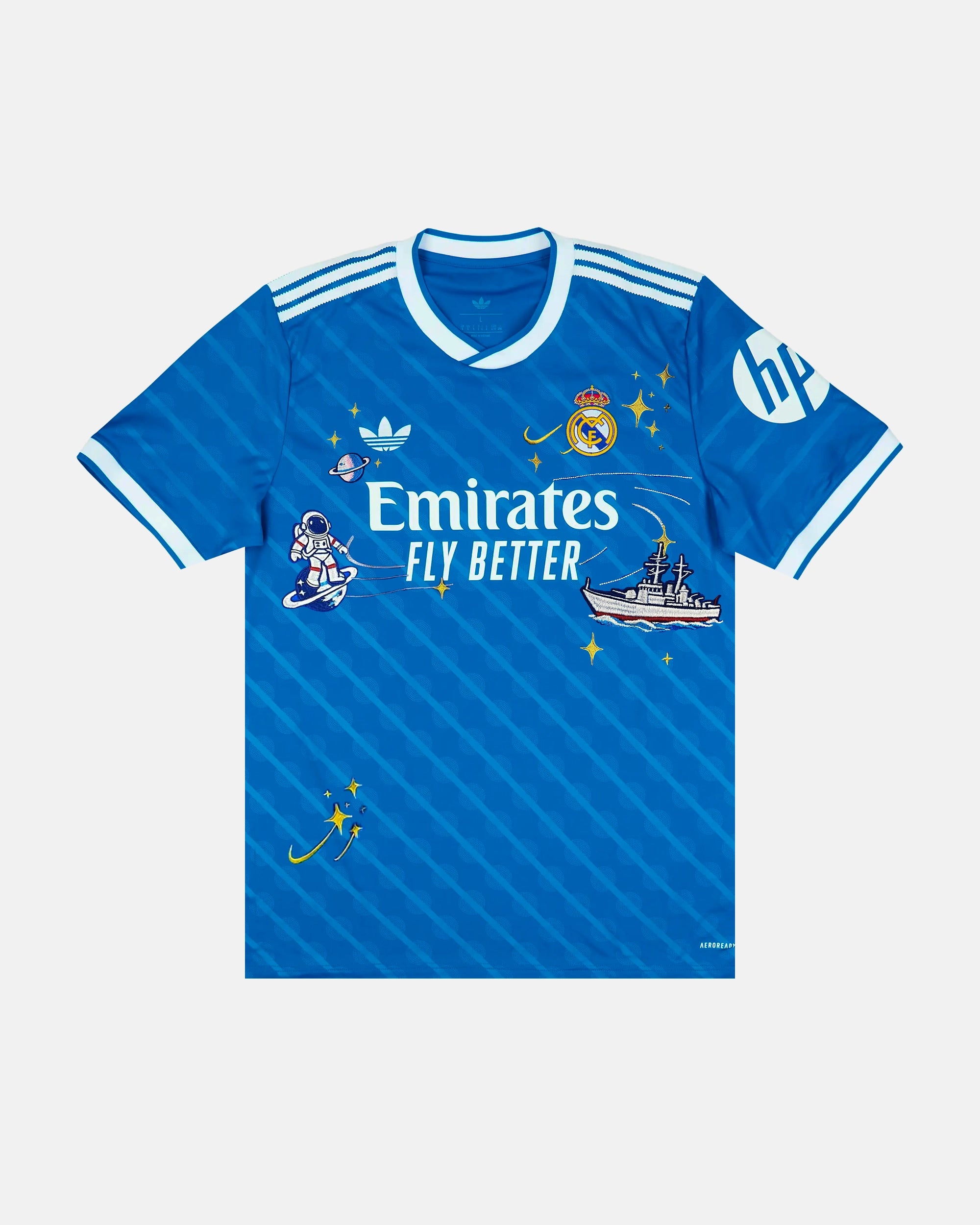 Full Front View Of The Bespoke Real Madrid Embroidered Jersey (Space Race Edition), Showcasing The Blue Diagonal-Striped Base Decorated With Hand-Stitched Astronaut and Warship Art.