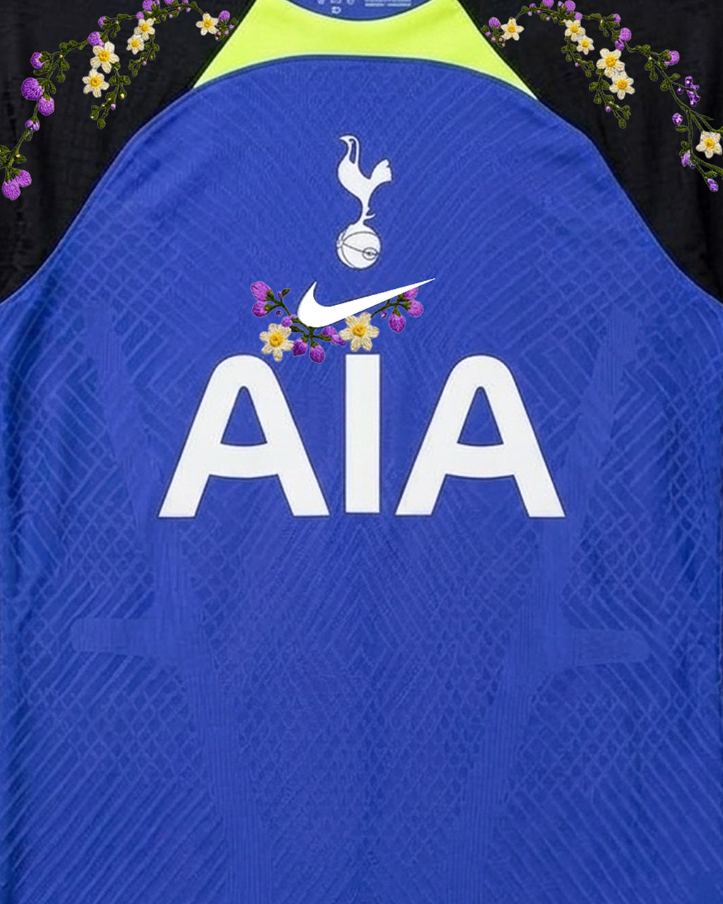 Hand-embroidered wildflower garland on black sleeve — Tottenham 'Seven Sisters' Edition — VOLTA Paris